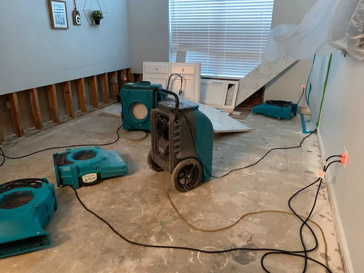 Dehumidifier in flood-cut room for Water Damage Restoration in Rye
